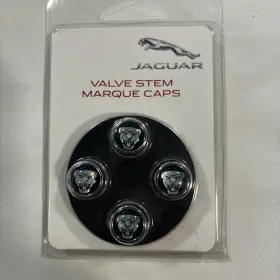 C2c39770 Jaguar Styled Valve Stem Marque Caps Growler Color Nip