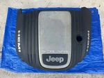 2005 - 2010 Jeep Grand Cherokee 5.7L Hemi Engine Cover Plastic Shield 53013718AB Used. Price: $99.99.