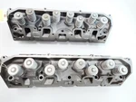 Pair Of Remanfucatured 4.1 Cadillac Cylinder Heads. 82-87. CASTING#910/694 Remanufactured. Price: $490.00.