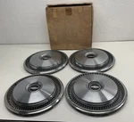 (4) Nos Gm 1973-75 Camaro Chevelle Nova 14"HUBCAPS 3997992 O3 New. Price: $125.95.
