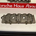 Porsche Lower Valve Cover 964.105.116.1R Used. Price: $125.00.