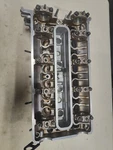 E38 Bmw M62TU Cylinder Heads Cyl. 1-4 Including Camshaft Caps Oem 11121745458 Used. Price: $600.00.